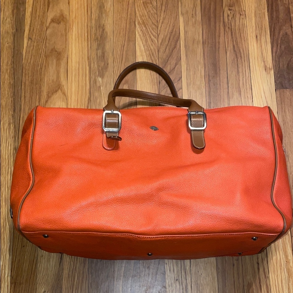 I Santi Large Pebbled Orange Leather Weekender Tote with‎ brown handles & strap.